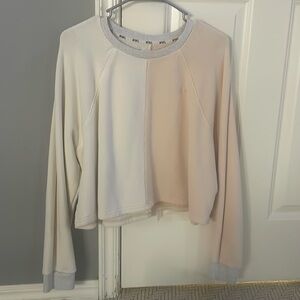 medium white and cream colored crew neck,